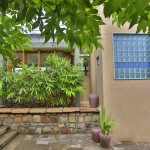 entrance landscape of villa aaranyak - weekend home design india