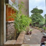 entrance landscape of villa aaranyak - weekend home design india