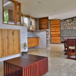 stone wall india - wooden door windows - modern villa interior design