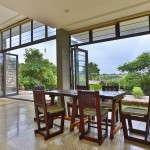 dinning area - wooden furniture - modern villa design india